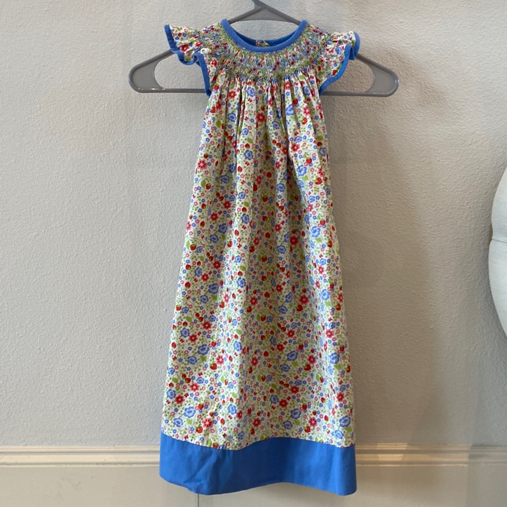 Girl’s Vive Le Fete floral smocked dress size 5. 100% cotton. Perfect condition